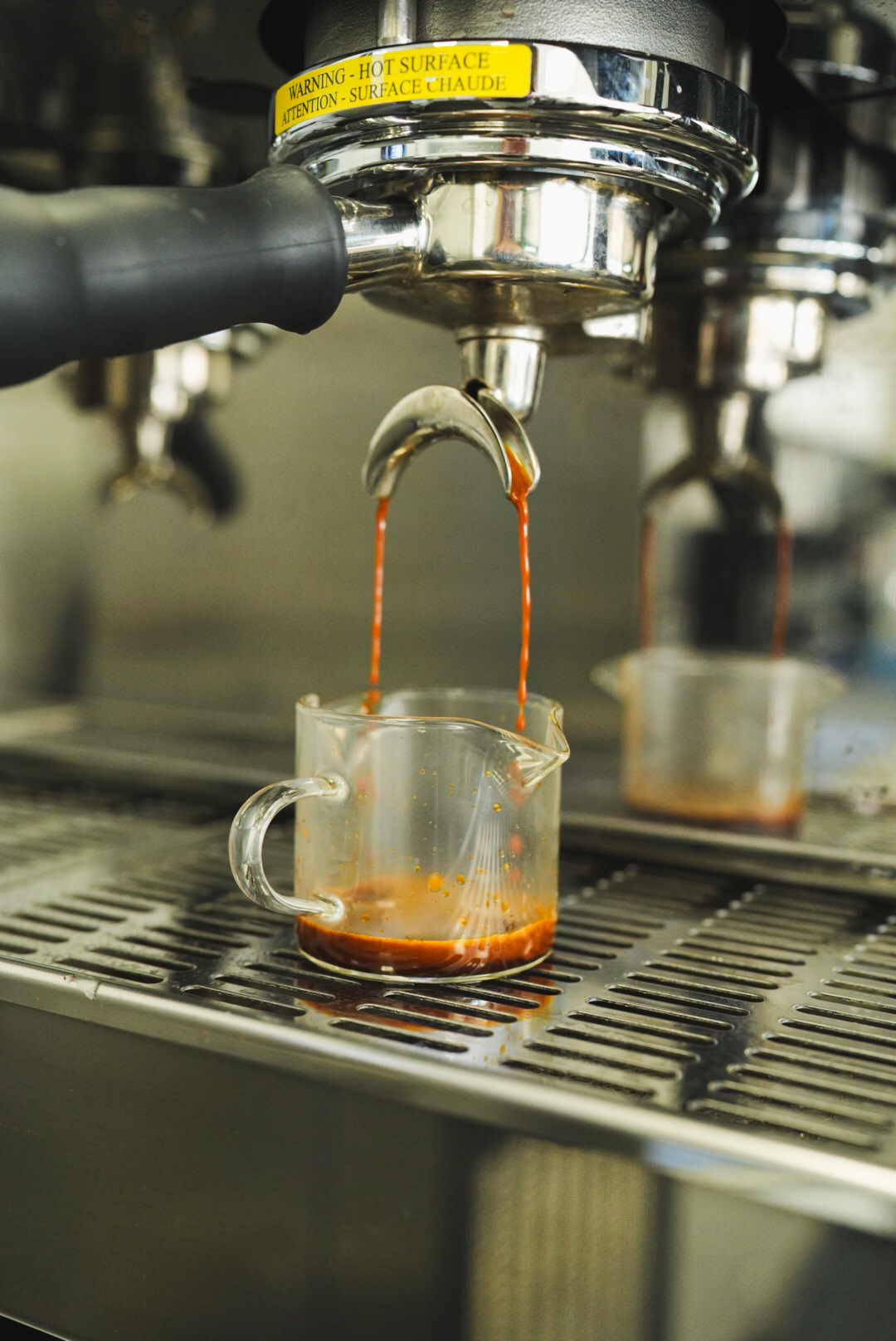 Espresso pulling at Tinto Time